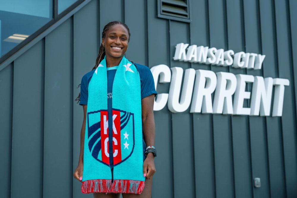 KC Current Player Holding Current Club Scarf Around Her Neck